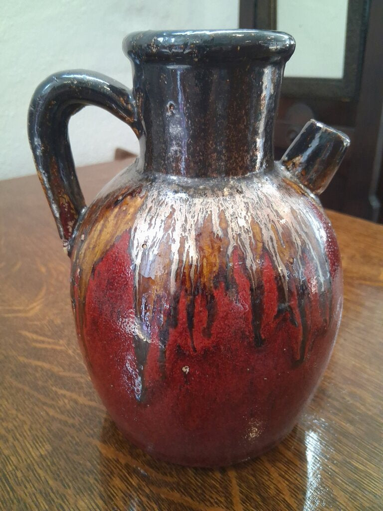 Glazed ceramic pitcher