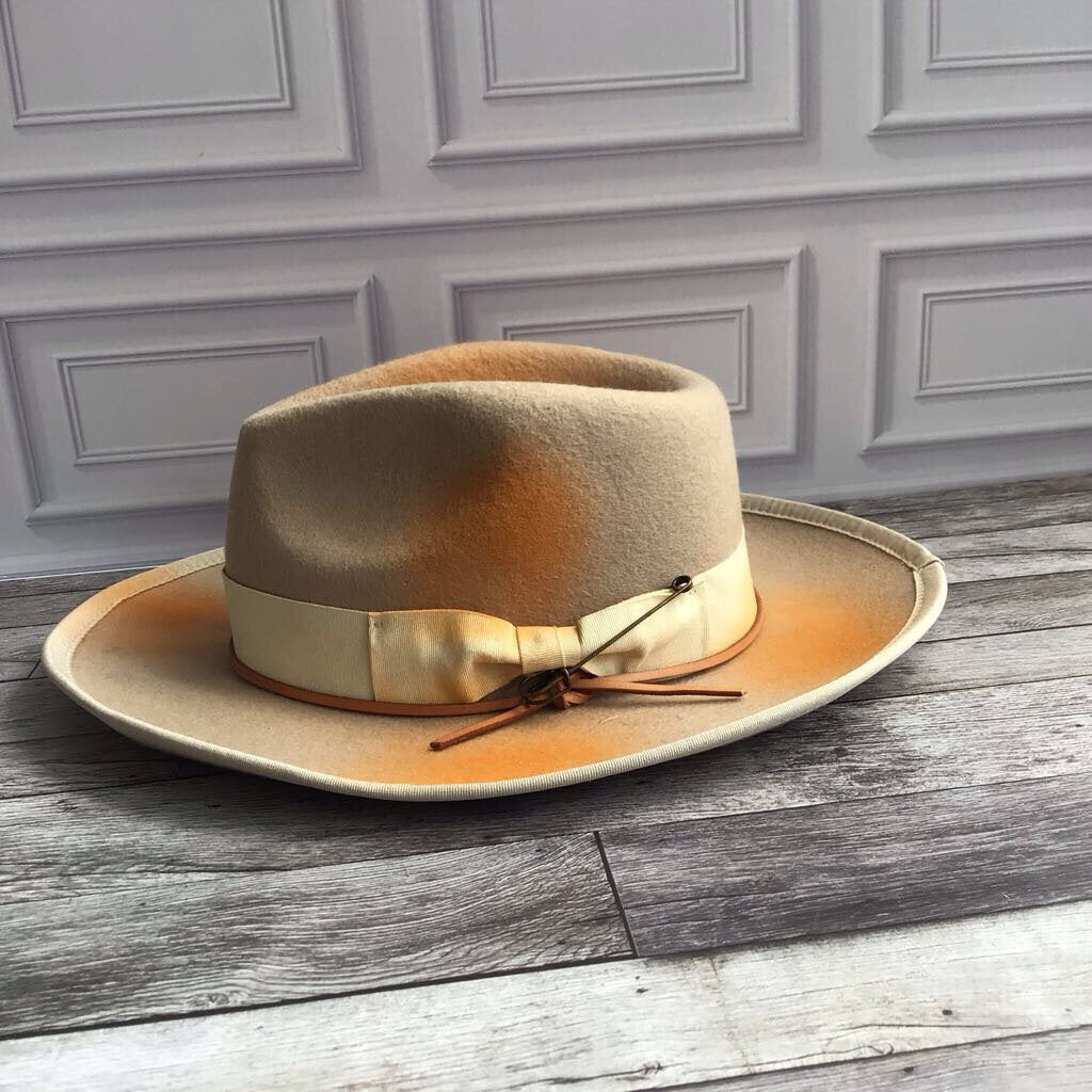 Brown with orange swea hat
