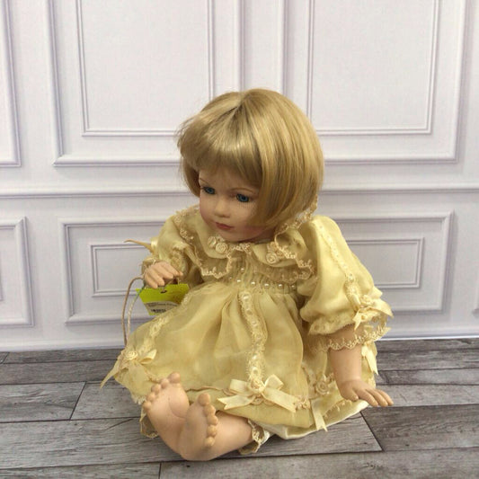Small Sitting Doll w/ White Dress\