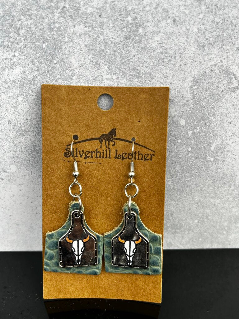 Stamped Earrings - teal w silver cow skull pendant