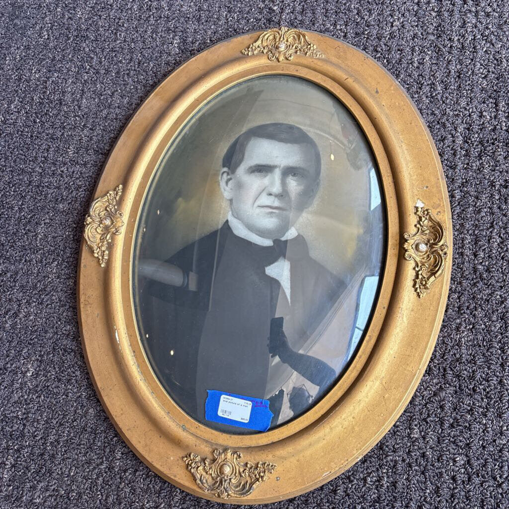 oval picture of a man